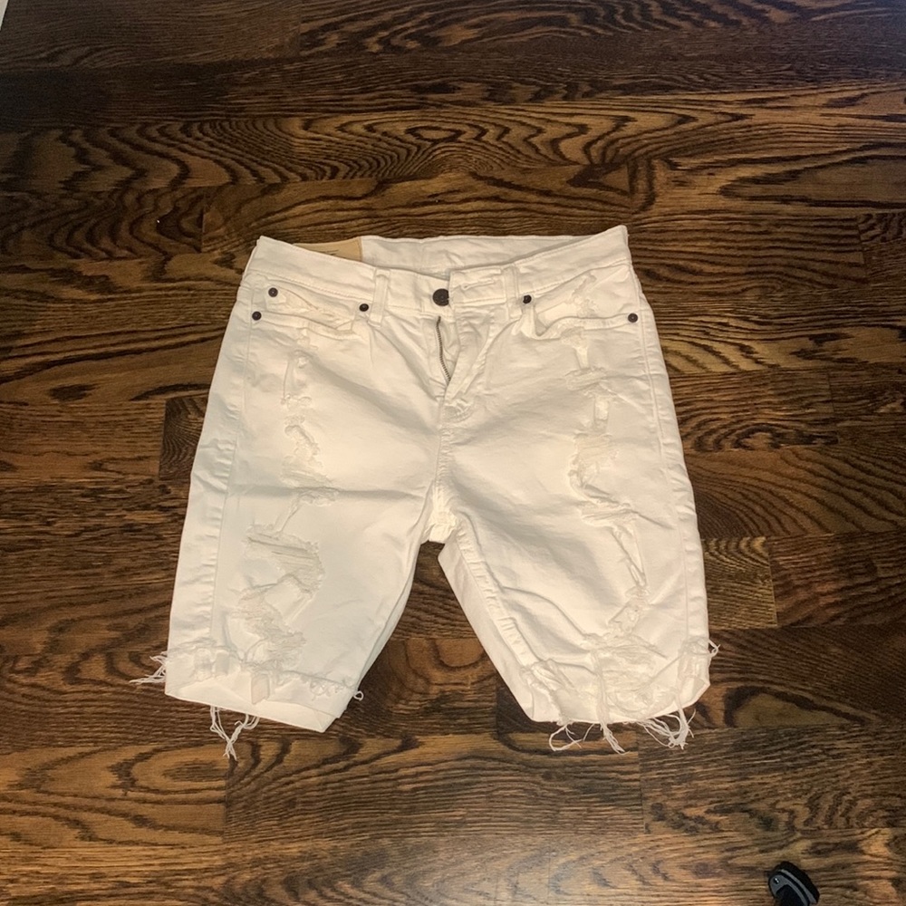 Men’s White denim shorts.